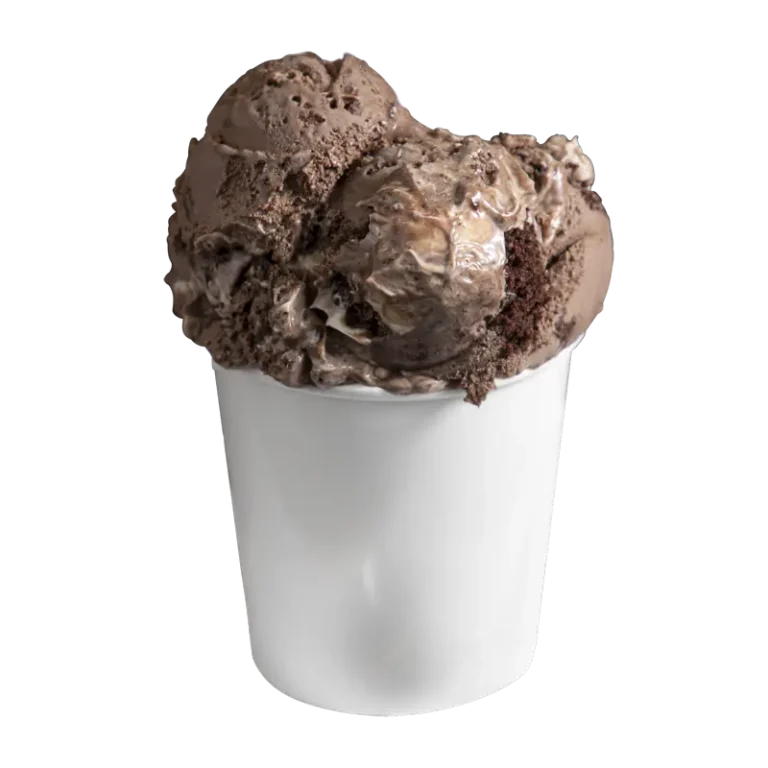 Chocolate cake batter ice cream with chunks of frosted chocolate cake and swirls of white buttercream frosting